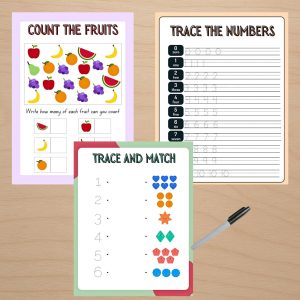 Toddler tracing book for learning to write letters and numbers with a dry-erase marker